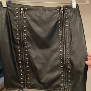 Leather studded mini skirt